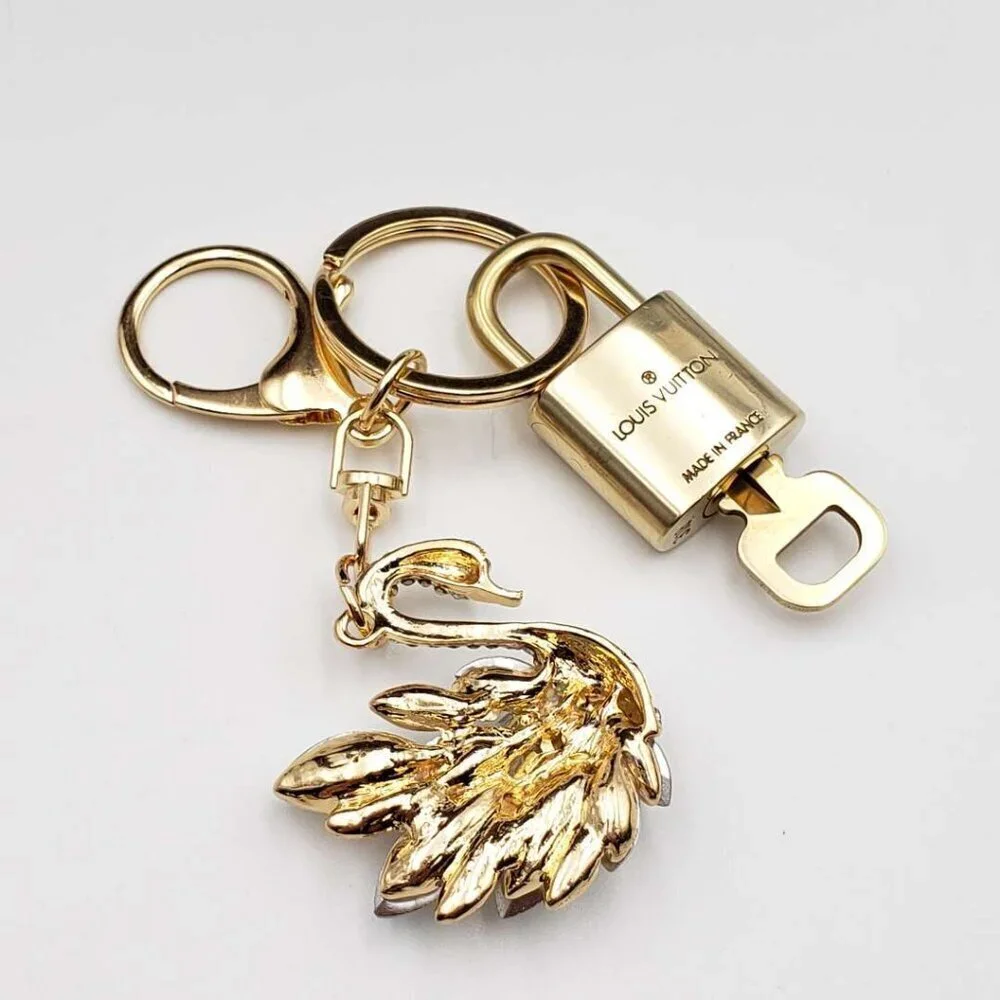 Authentic Louis Vuitton Gold Padlock & Key with Unbranded Swan Keychain - Picture 4 of 8